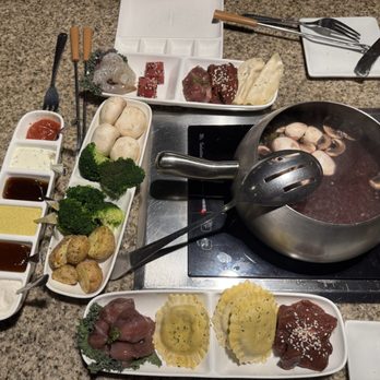 The Melting Pot - Coq au Vin entree course - Fondue Near Me - Duluth, Georgia