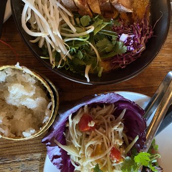 Bida Manda - Green papaya salad with steak and crispy pork belly soup with complimentary sticky rice - Laotian Near Me - Raleigh, North Carolina