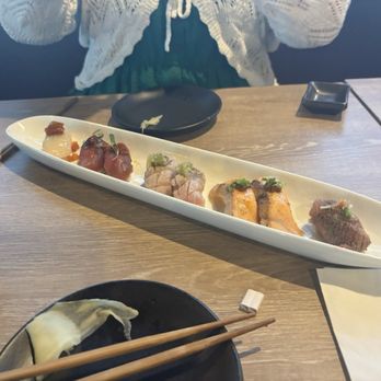 Bleu Bear Sushi - Left to right here:  HOTATE UNI IKURA  AKAMI BLEU BEAR STYLE  SEARED OTORO  SEARED SAKE TORO YUZU SAUCE  SEARED JAPANESE WAGYU - Sushi Bars Near Me - Bedford, Texas