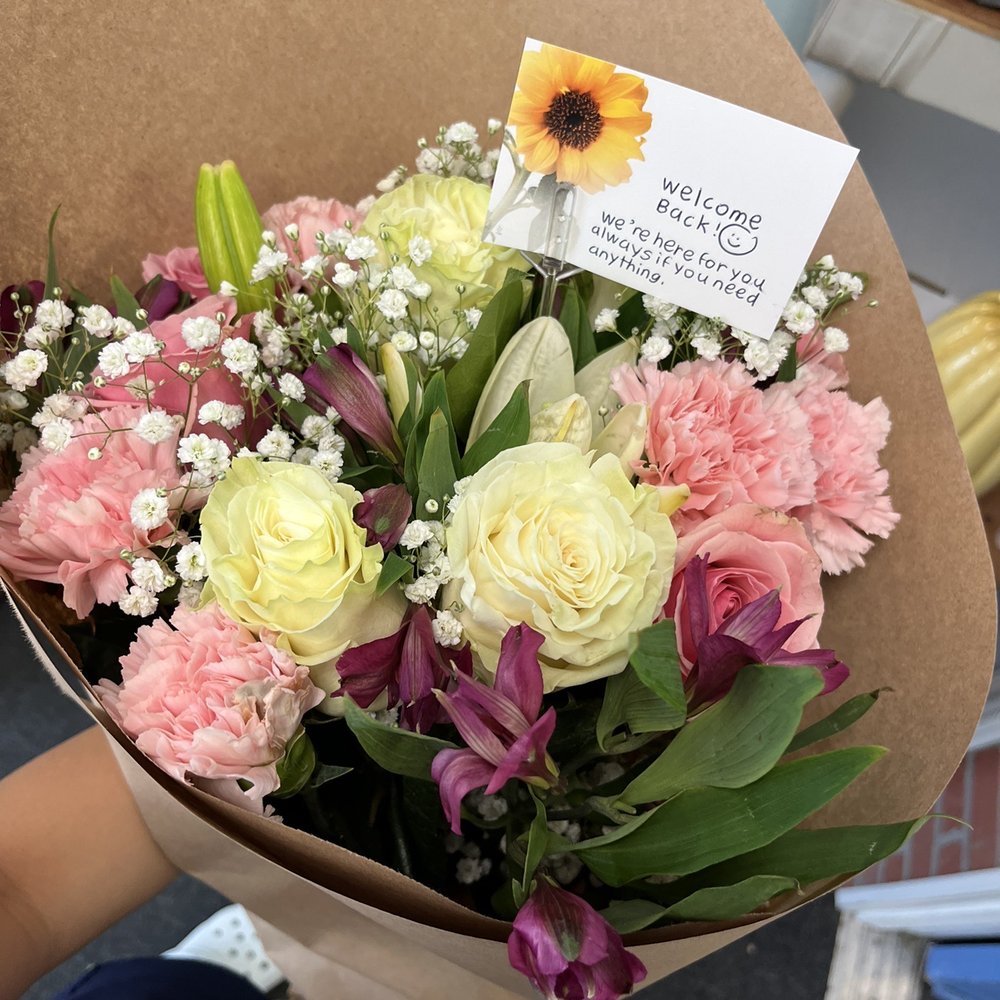 Floral Arrangement (~$40) Floral Arrangement (~$40)