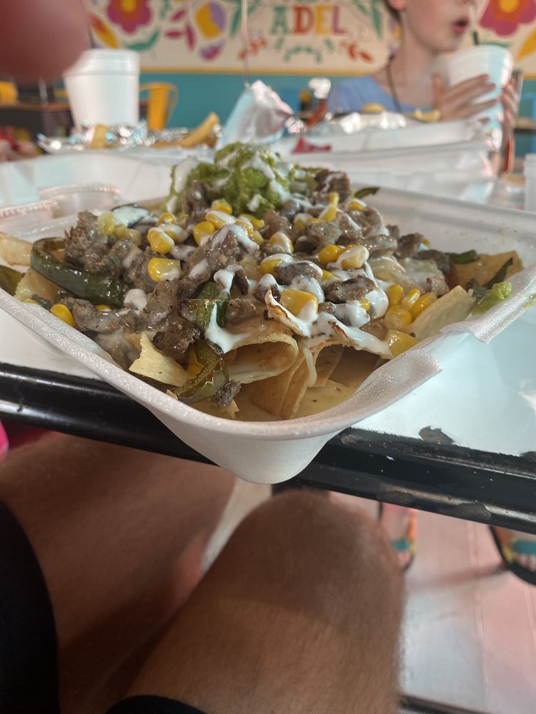 Rico's Tacos - Adel Logo