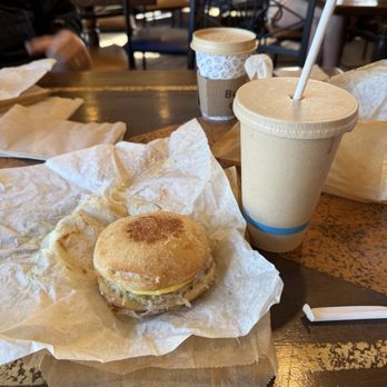 Kerckhoff Coffee House - Iced almond milk carmel latte and the spicy egg and sausage sandwhich. - Coffee & Tea Near Me - Los Angeles, California