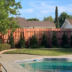 Economic Fence - This is the back fence about 75% done. Look how straight it is.