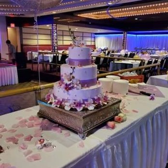 Green Forest Tea House - a wedding cake on a table - Bakeries Near Me - Lowell, Massachusetts Green Forest Tea House - a wedding cake on a table - Bakeries Near Me - Lowell, Massachusetts