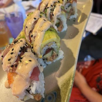 Sansei Seafood & Sushi Bar - Yum yum sauce over Panko Crusted Ahi Sashimi Sushi Roll made the roll! - Japanese Near Me - Waikoloa, Hawaii Sansei Seafood & Sushi Bar - Yum yum sauce over Panko Crusted Ahi Sashimi Sushi Roll made the roll! - Japanese Near Me - Waikoloa, Hawaii