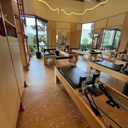 Spring Theory Pilates - Small Group reformer room.