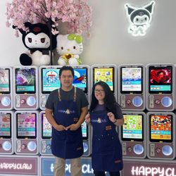 Happy Claw Arcade - Helpers at our Japanese gachapon machines.
