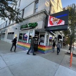Fresh Stop Produce and Market - Front, directly East of the Belmont station