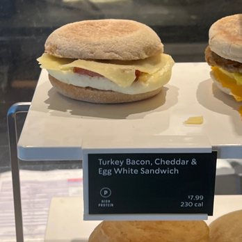 Starbucks - two breakfast sandwiches on display in a glass case - Coffee & Tea Near Me - D'Iberville, Mississippi