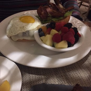 Arizona Inn - Avocado burger with an egg and fruit salad - Bars Near Me - Tucson, Arizona Arizona Inn - Avocado burger with an egg and fruit salad - Bars Near Me - Tucson, Arizona