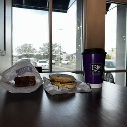 PJ's Coffee - Coffee cake, breakfast sandwich and coffee.