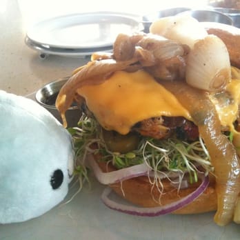 The Counter - Veggie burger with sauteed onions, mushrooms, cheese, sprouts and jalepenos (ignore my seal plz :) ) - Burgers Near Me - Honolulu, Hawaii