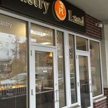 Pastry Land - The outside, tucked under an awning and back a bit from the sidewalk on Hancock Street. - Bakeries Near Me - Quincy, Massachusetts