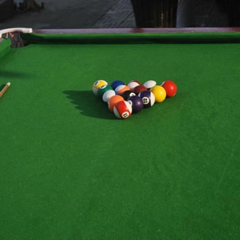 The Wet Spot - a pool table with several billiards - Pubs Near Me - Decatur, Indiana