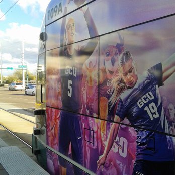 Valley Metro - You never know how trains will be painted.  Here are some hard working jockettes playing hoops for Grand Canyon Univ. - near the rail line. - Public Transportation Near Me - Phoenix, Arizona