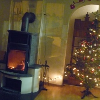 Balmer's Herberge - Wood Stove and Common Area - Hostels Near Me - Interlaken, BE Balmer's Herberge - Wood Stove and Common Area - Hostels Near Me - Interlaken, BE