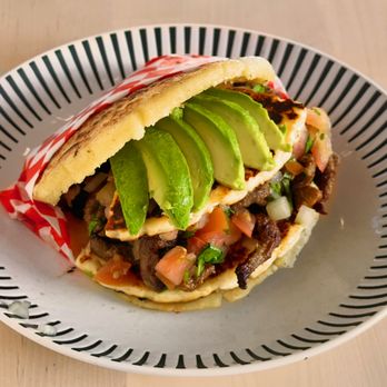 Mi Venezuela - a plate with a sandwich and avocado - Venezuelan Near Me - Vernon, California
