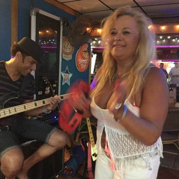 Nickie's 1971 - Nickie's has an Open Mic Night every Tuesday from 8 pm to midnight. Locals and visitors are welcome. Everybody can shake a tambourine! - Sports Bars Near Me - Tybee Island, Georgia Nickie's 1971 - Nickie's has an Open Mic Night every Tuesday from 8 pm to midnight. Locals and visitors are welcome. Everybody can shake a tambourine! - Sports Bars Near Me - Tybee Island, Georgia