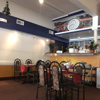 Thali of India - a dining area with tables and chairs - Indian Near Me - Corning, New York Thali of India - a dining area with tables and chairs - Indian Near Me - Corning, New York