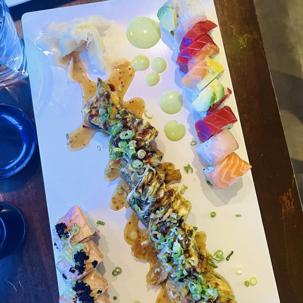 Fins At Sharky's - Rainbow roll, crab rangoon roll, Fin roll - Steakhouses Near Me - Venice, Florida Fins At Sharky's - Rainbow roll, crab rangoon roll, Fin roll - Steakhouses Near Me - Venice, Florida