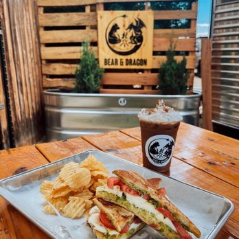 Bear & Dragon - Mexican Rose latte and the traveler Panini - Coffee & Tea Near Me - Prescott, Arizona Bear & Dragon - Mexican Rose latte and the traveler Panini - Coffee & Tea Near Me - Prescott, Arizona