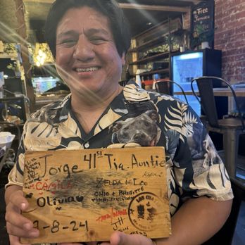 Los Cuates Seafood and Bar - Kokito with a really cool wooden sign for his cumple! - Seafood Near Me - Chula Vista, California Los Cuates Seafood and Bar - Kokito with a really cool wooden sign for his cumple! - Seafood Near Me - Chula Vista, California