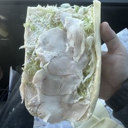 Jimmy John's - This is how much meat they put on a $8 sandwhich 3 little thin slices.