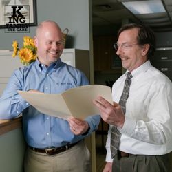 King Family Eye Care - Dr King and Dr Lavoie confer on patient care.