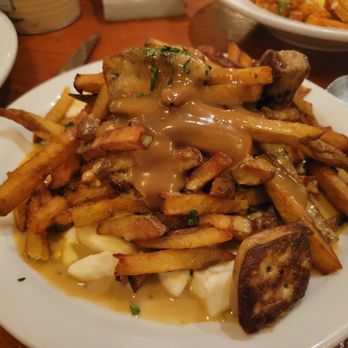 Au Pied de Cochon - Fois gras poutine - Canadian (New) Near Me - Montreal, Quebec Au Pied de Cochon - Fois gras poutine - Canadian (New) Near Me - Montreal, Quebec
