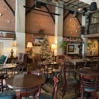 Lost Boy Dry Goods - Christmas tree and menorah up for the holidays ! They just opened so we had the place to ourselves for just a little bit :) - Cocktail Bars Near Me - Miami, Florida