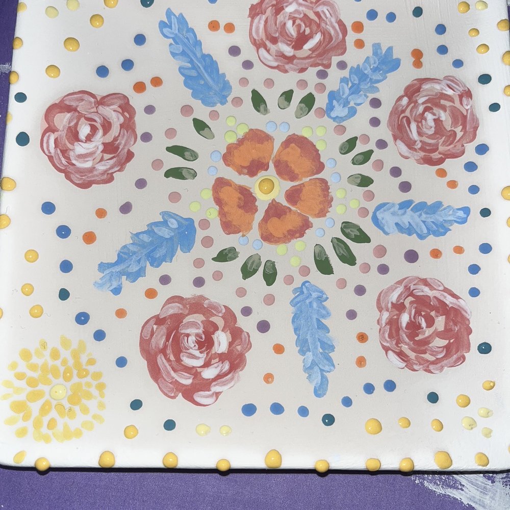 My art piece before it was glazed and kilned. My art piece before it was glazed and kilned.
