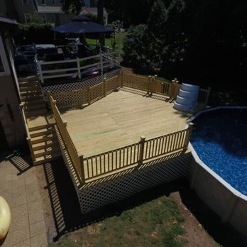 Revitalization Dynamics - an above ground pool and deck - Decks & Railing Near Me Revitalization Dynamics - an above ground pool and deck - Decks & Railing Near Me