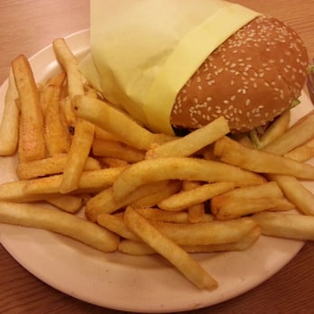 Savory Burger - Avocado cheeseburger and fries. Tons of seasoning salt sprinkled on the fries - Burgers Near Me - Long Beach, California