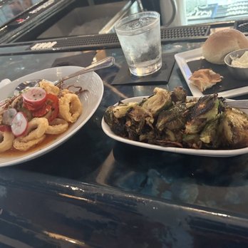 Hogfish Harry's Restaurant + Bar - Fried calamari and maple syrup Brussels sprouts - Seafood Near Me - Naples, Florida Hogfish Harry's Restaurant + Bar - Fried calamari and maple syrup Brussels sprouts - Seafood Near Me - Naples, Florida