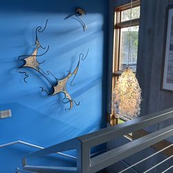 The Crash Pad - Cute stairway with more art.