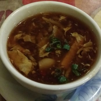 Panda East - Complimentary Hot and Sour Soup. Very peppery and filled with goodies! - Chinese Near Me - Amherst, Massachusetts