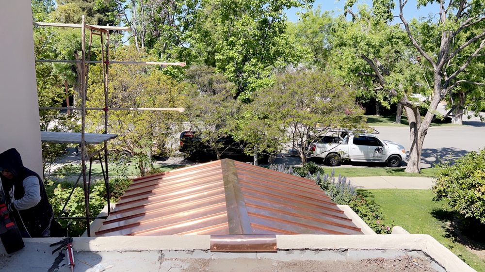 Slide of K-9 Custom Roofing