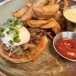 Beef bulgogi eggs Benedict with the most delicious sweet smoked red pepper sauce. HIGHLY recommend. Sauce on the side. Beef bulgogi eggs Benedict with the most delicious sweet smoked red pepper sauce. HIGHLY recommend. Sauce on the side.