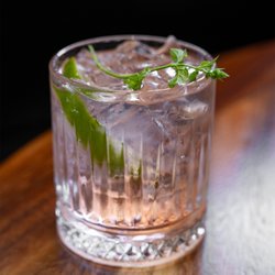 Cocina & Cantinamexican Grill - An iced mojito garnished with a fresh mint sprig and a lime wedge at Cocina&Cantina in Loveland.