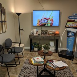 Achieve Wellness Chiropractic Center - Waiting room and orthopedic foot scan