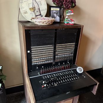 Piloni's Italian Steakhouse - Entry way has an old phone switch board from the building. - Italian Near Me - Brazil, Indiana