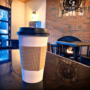 1922 Coffee and Brew - Interior with medium cafe latte. - Bars Near Me - Painesville, Ohio 1922 Coffee and Brew - Interior with medium cafe latte. - Bars Near Me - Painesville, Ohio