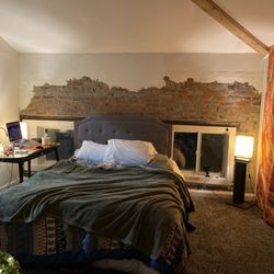 All Property Management - My clean cozy bedroom via All Property Management in a 1br apartment with top floor views of the city.