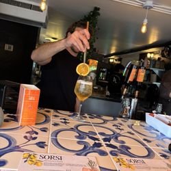Sorsi Waterfront - Apricot Spritz