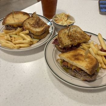 Village Cafe - Reuben and beefeater sandwiches with fries, coleslaw, and peach iced tea. - American Near Me - Long Beach, California