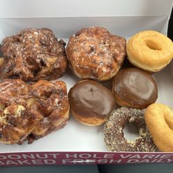 Daynight Donuts - Banana Fritter, Boston Kreme, Plain Cake, Raised Glazed, Raspberry Chocolate, Double Chocolate Cake, German Chocolate