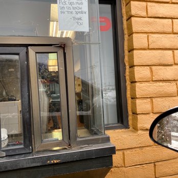Burrito Station - a window with a sign on it - Mexican Near Me - Chicago Heights, Illinois