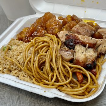 Famous Wok - 2 item combo, half/half, with orange chicken and bourbon chicken. - Chinese Near Me - Humble, Texas Famous Wok - 2 item combo, half/half, with orange chicken and bourbon chicken. - Chinese Near Me - Humble, Texas