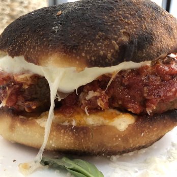Pitruco Pizza - Meatball sandwich with bufala mozzarella, parmesan, marinara, basil and prosciutto on milk bread - Pizza Near Me