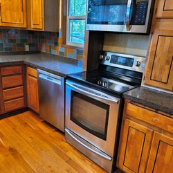 Old Kettle Road Woodworking - Before refinishing scratched and water damaged cupboards.